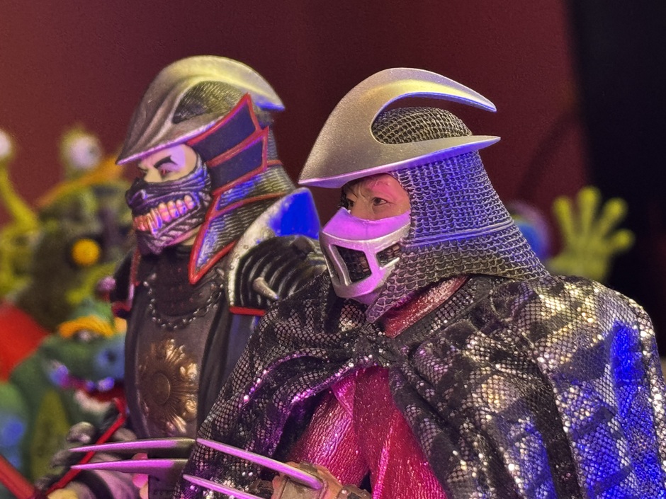 NECA TMNT x Universal Monsters Shredder as Dracula with the Hanna facemask next to the NECA TMNT 1990 Shredder